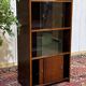 Small English oak library from the 1960s with sliding doors.