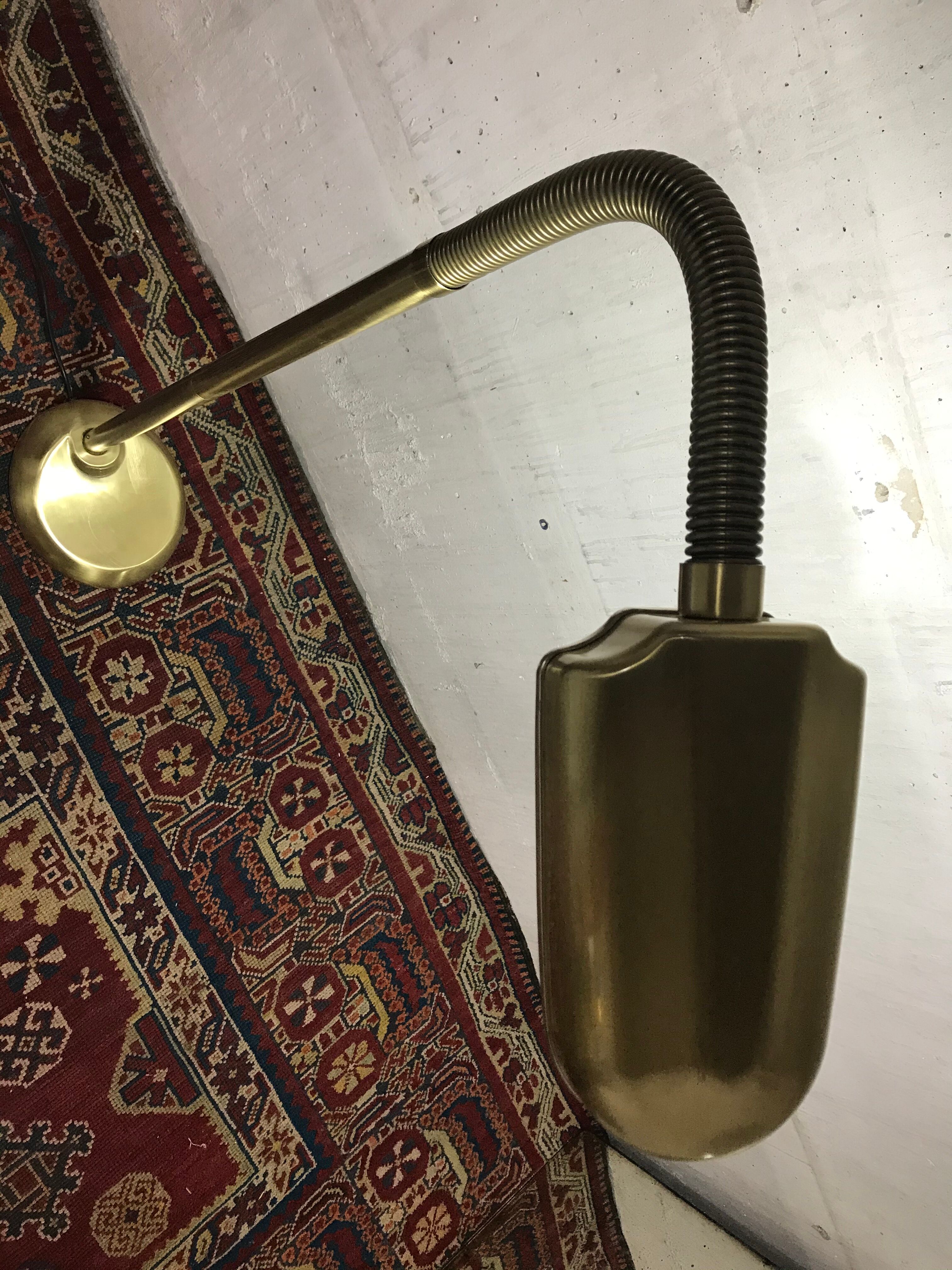 Golden articulated lamppost