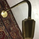 Golden articulated lamppost