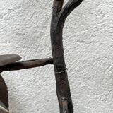 Wall lamp in wrought iron.