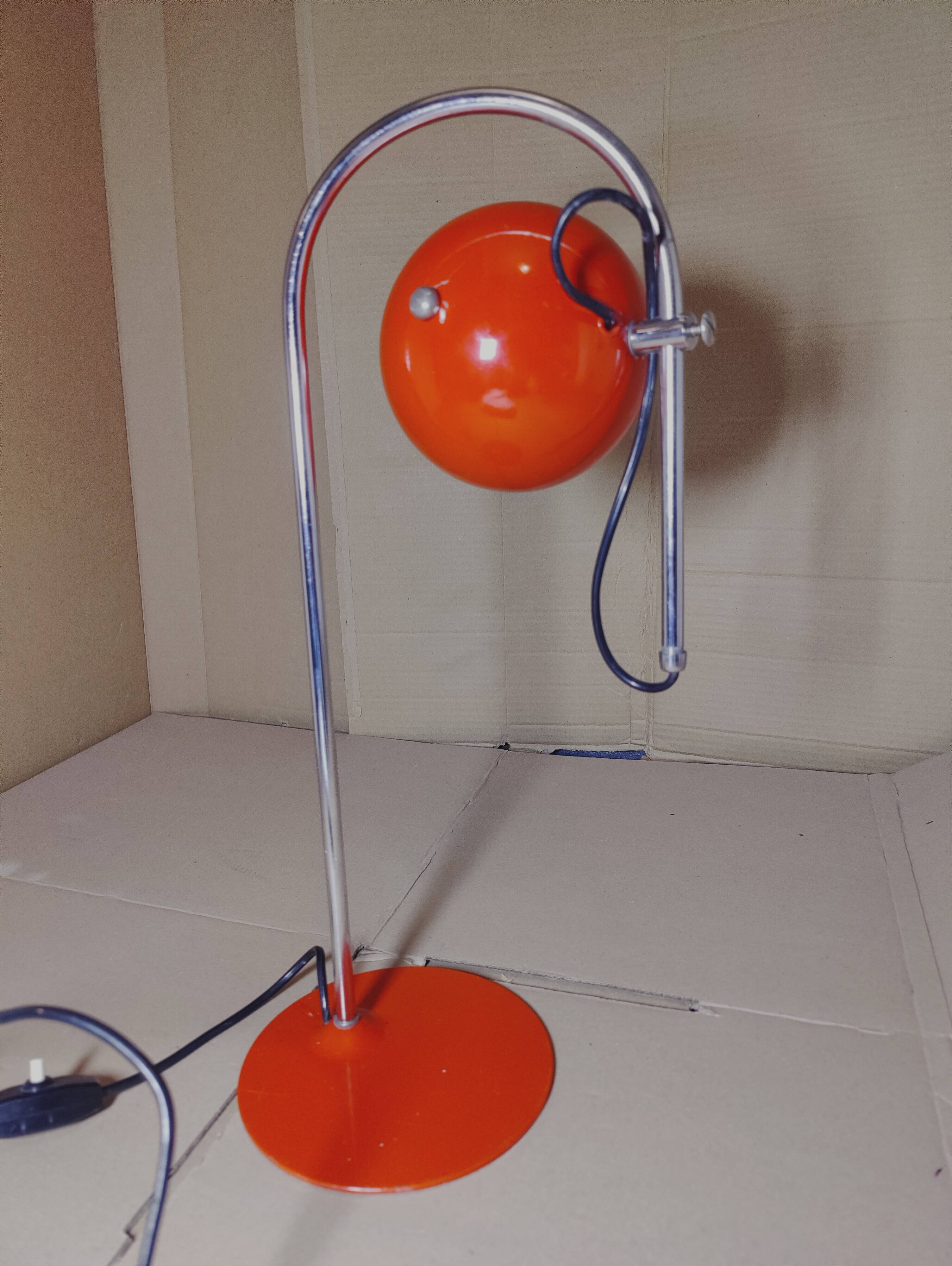 Eyeball space age orange desk or bedside lamp on an arc base