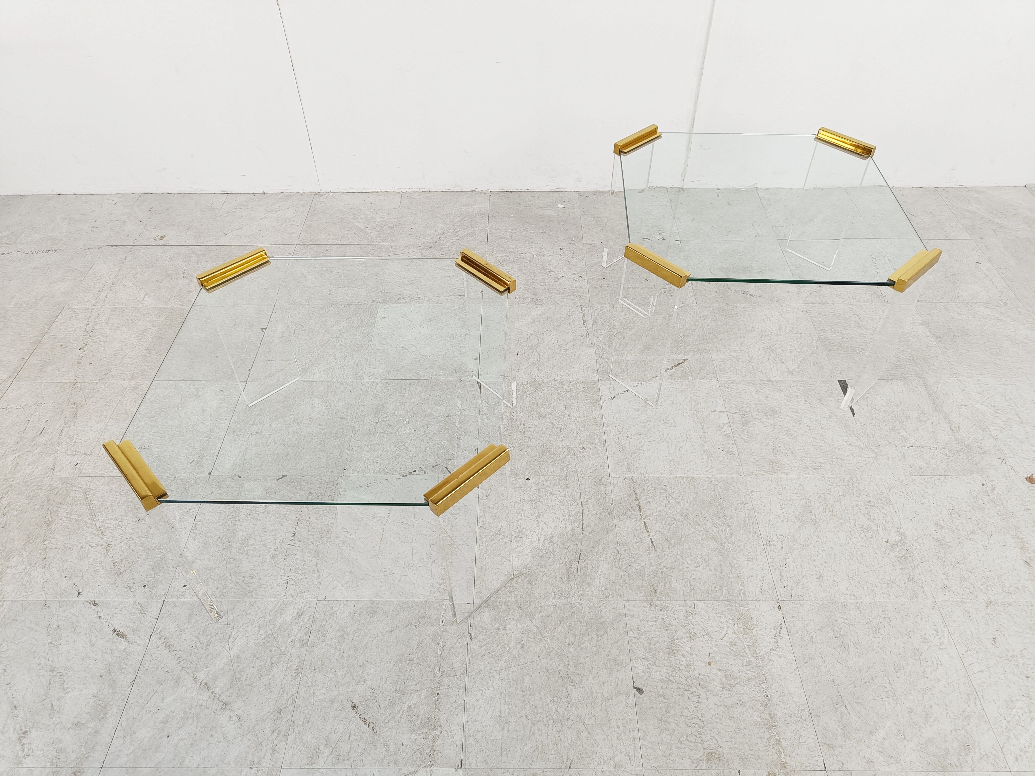 Lucite and brass coffee or side tables, 1970s