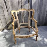 Louis XVI wing chair and its footrest