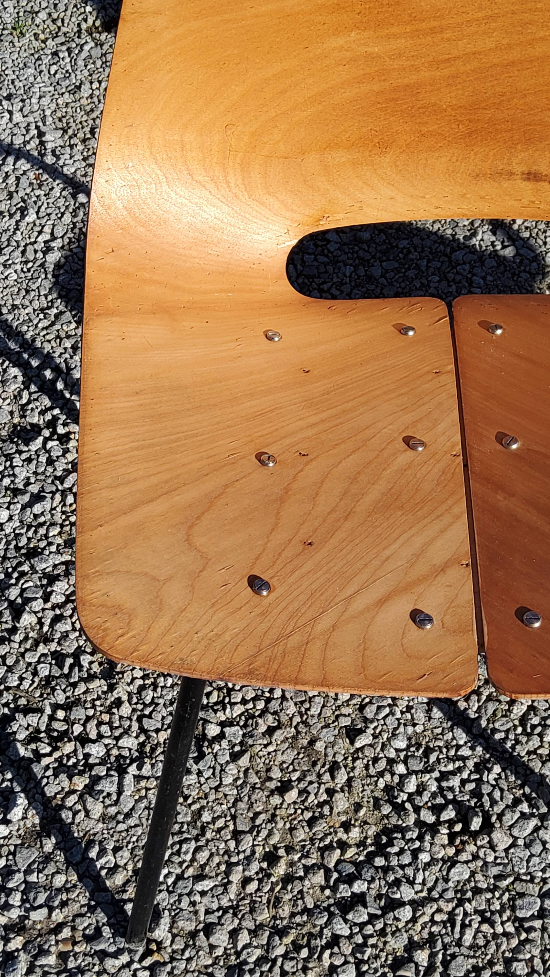 Pair of tonneau chairs by Pierre Guariche plywood base tubes 1954