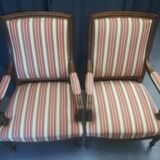 Pair of Louis XVI style walnut armchairs
