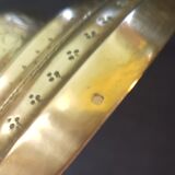 Chiseled gilded metal candlesticks