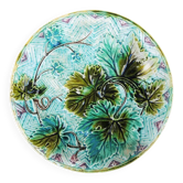 Old slipware plate: vine leaves