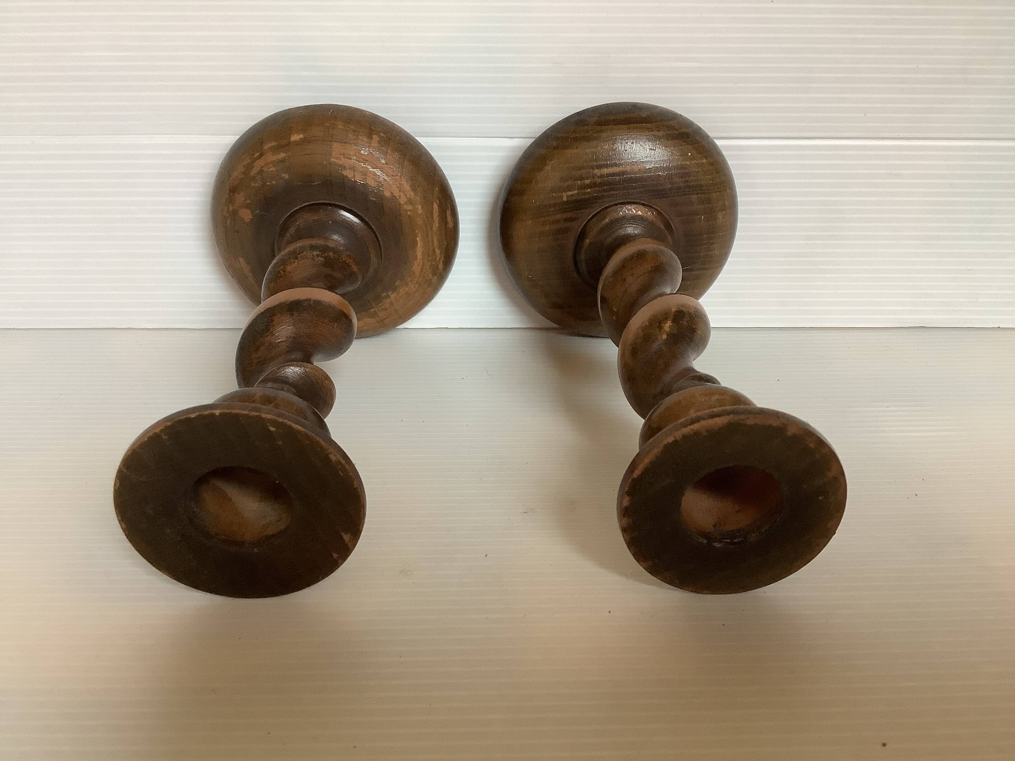 Pair of twisted turned wood candlesticks