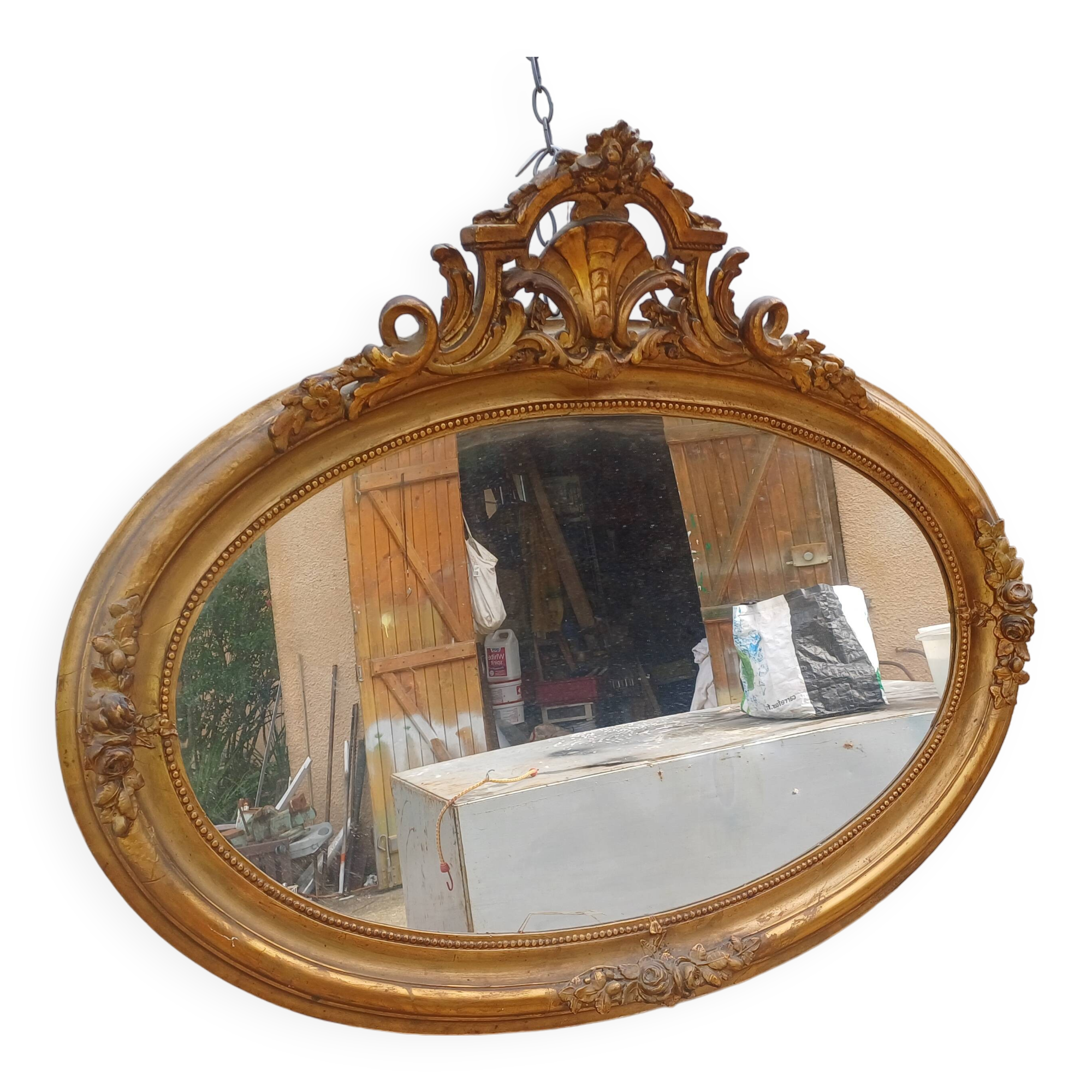 Oval mirror wood and gilded stucco 19th century