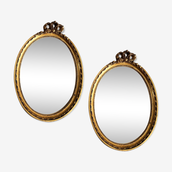2 miroirs ovales dorés 28x20 cm
