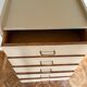 Mocha compass foot chest of drawers