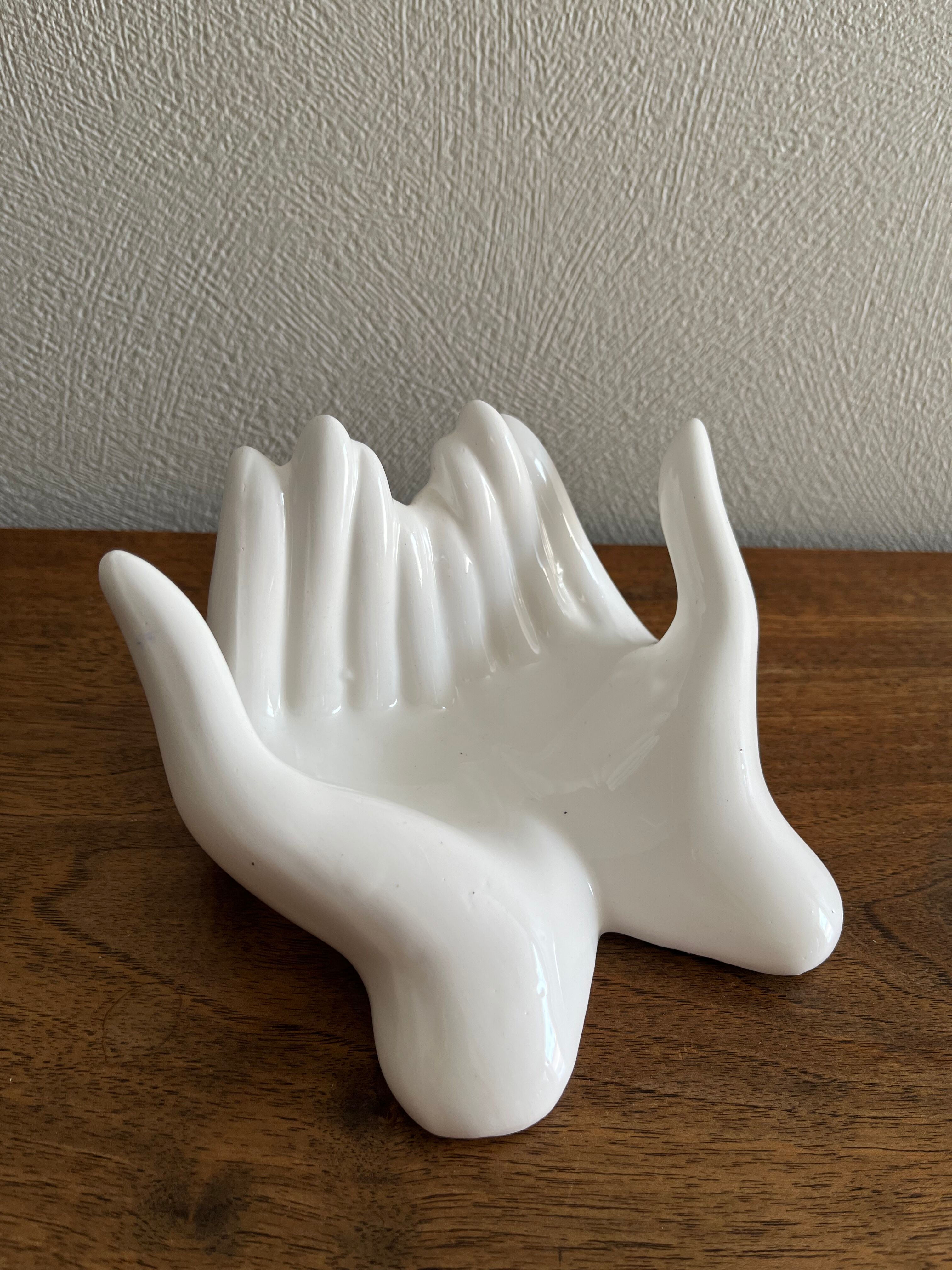Empty white ceramic hand pocket