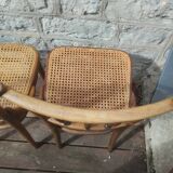 Set of 2 antique bistro chairs. Curved and turned wood.