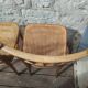 Set of 2 antique bistro chairs. Curved and turned wood.