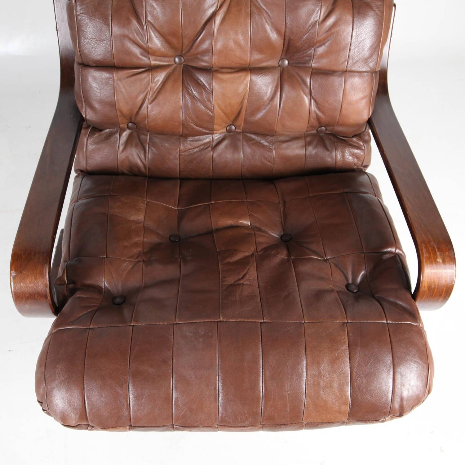 Fauteuil vintage en bois et cuir