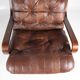 Fauteuil vintage en bois et cuir