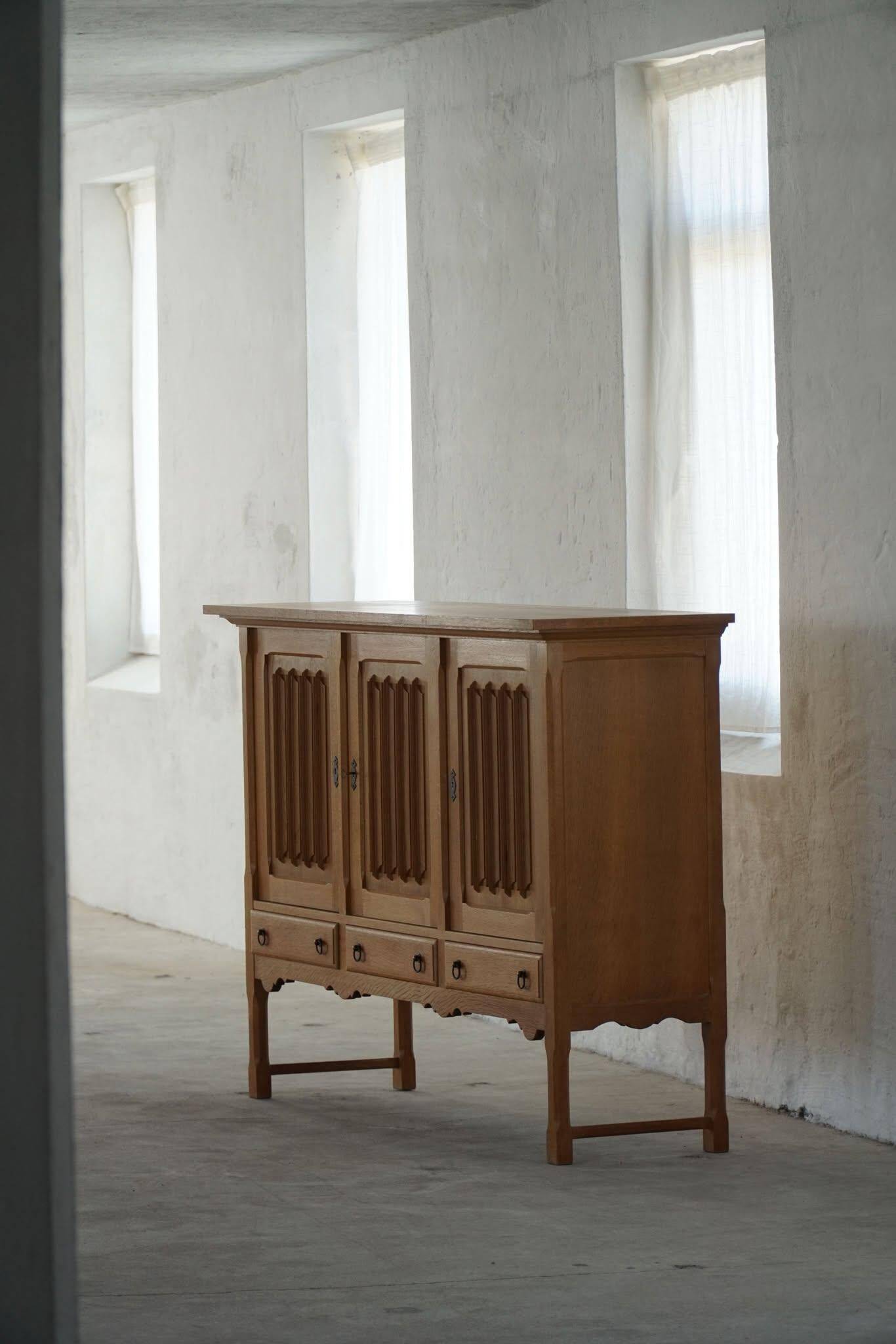 Brutalist oak sideboard, mid-century Danish design, Kjærnulf style, 1960s.