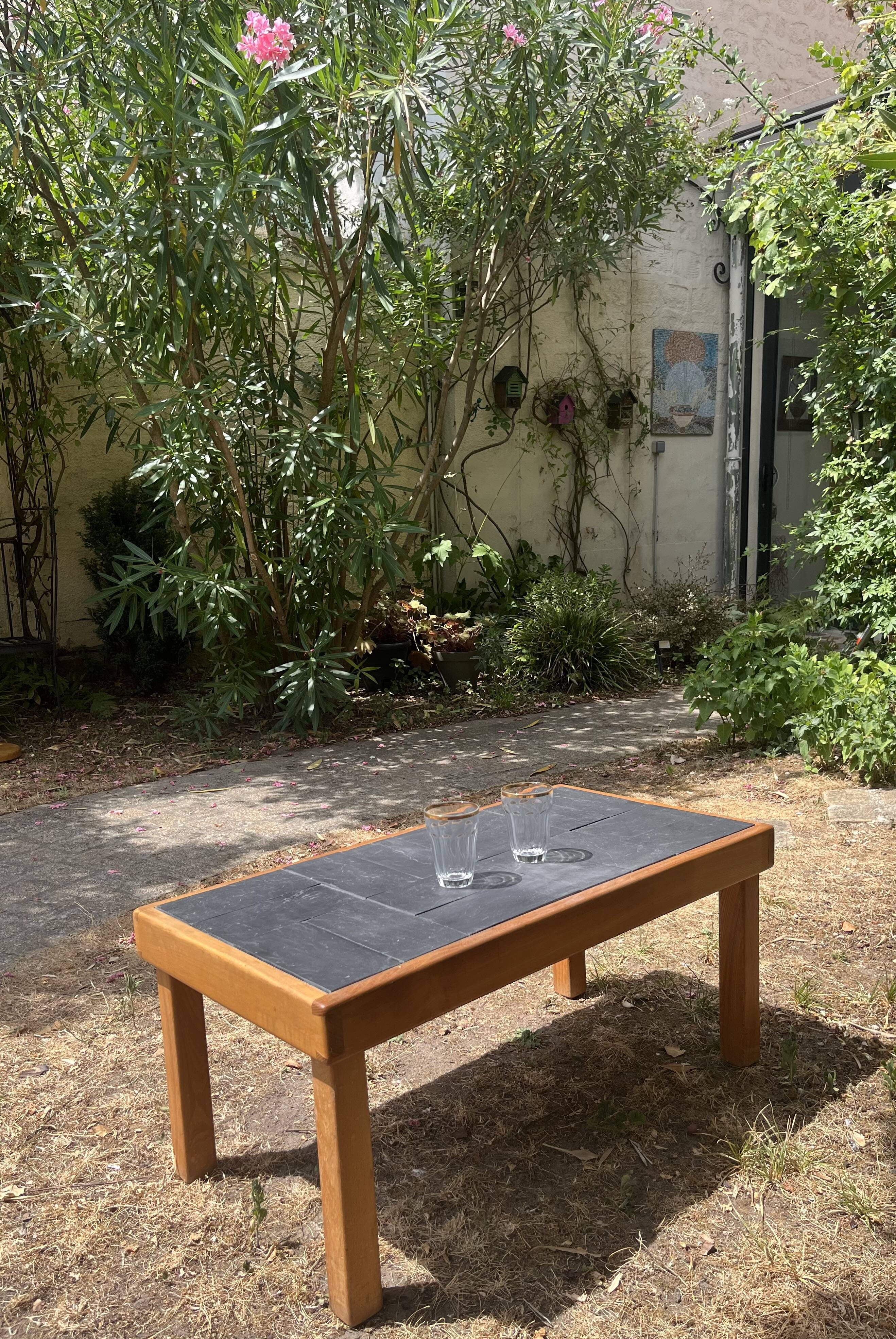 Vintage coffee table in solid wood and slate – 1970s – Modernist style