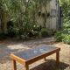 Vintage coffee table in solid wood and slate – 1970s – Modernist style