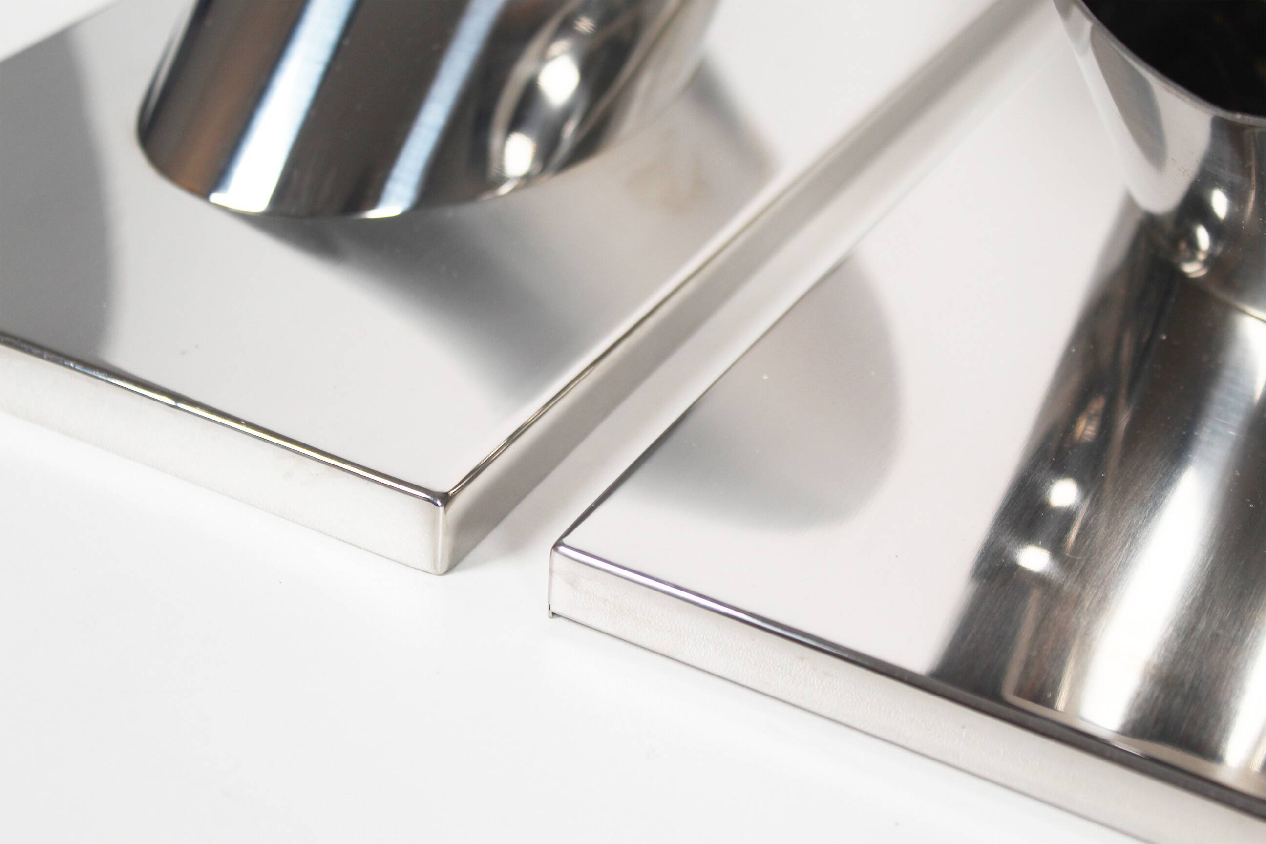 Set of three large sculptural vintage chrome metal wall lights