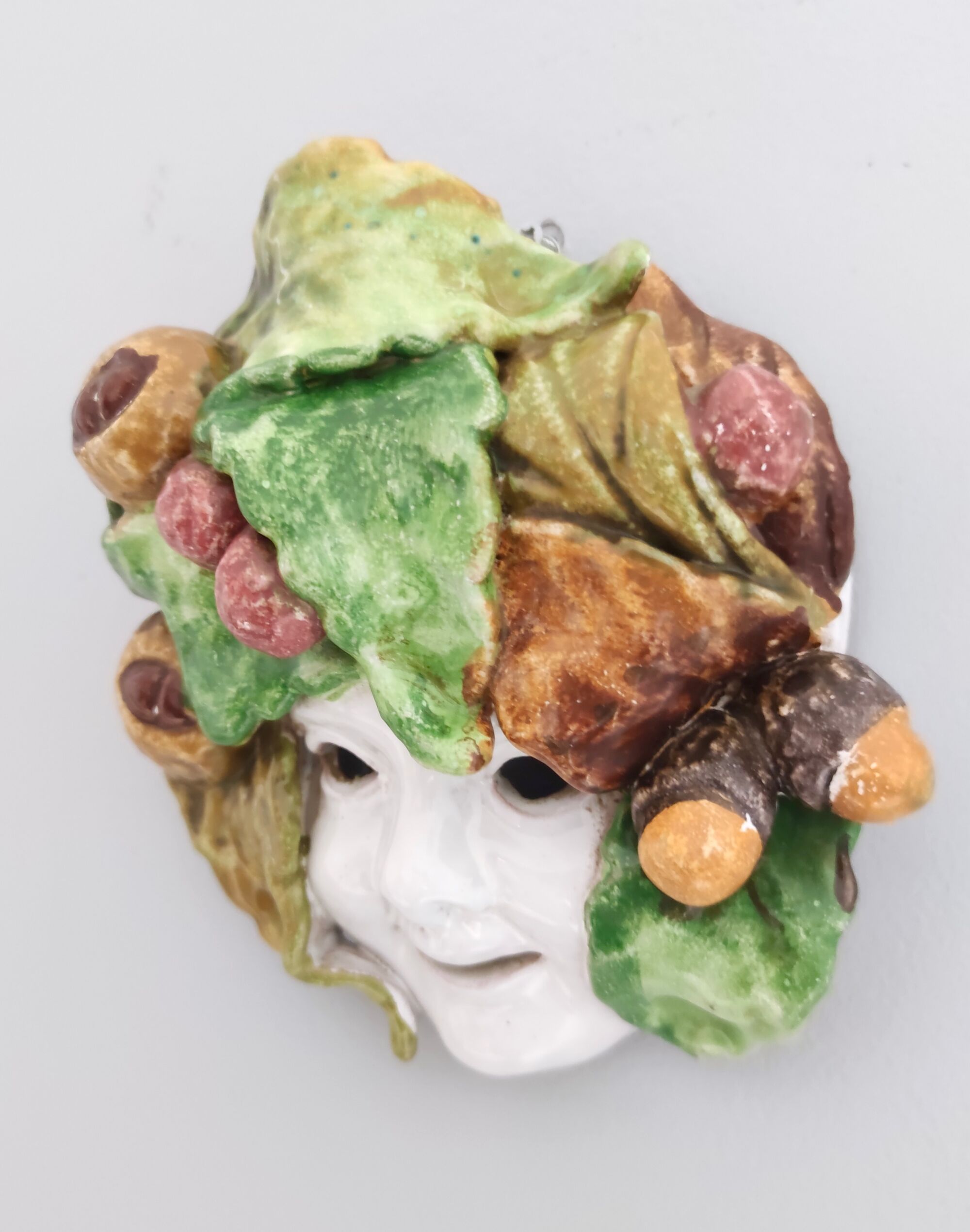 Vintage earthware commedia mask, florence