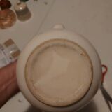 Moustiers style floral motif earthenware pitcher signed
