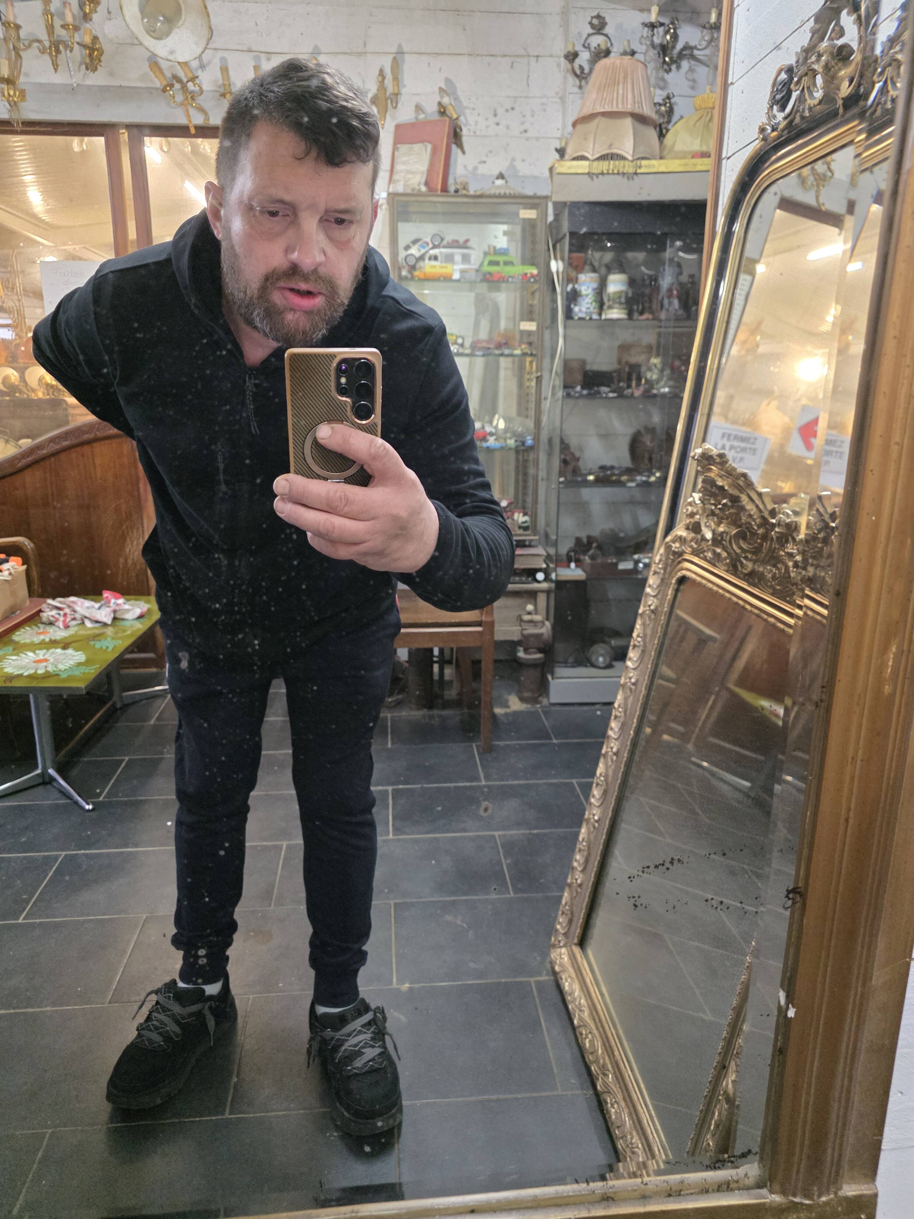 Art Deco gilded trumeau, bevelled mirror