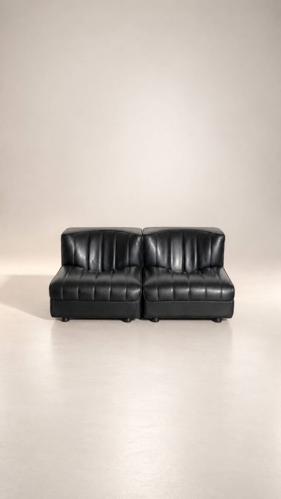 Modular black leather sofa '9000' by Tito Agnoli