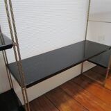 Black and gold metal tomado wall shelf