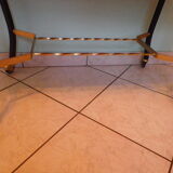Lounge table, side table on wheels, formica top, gold and black metal
