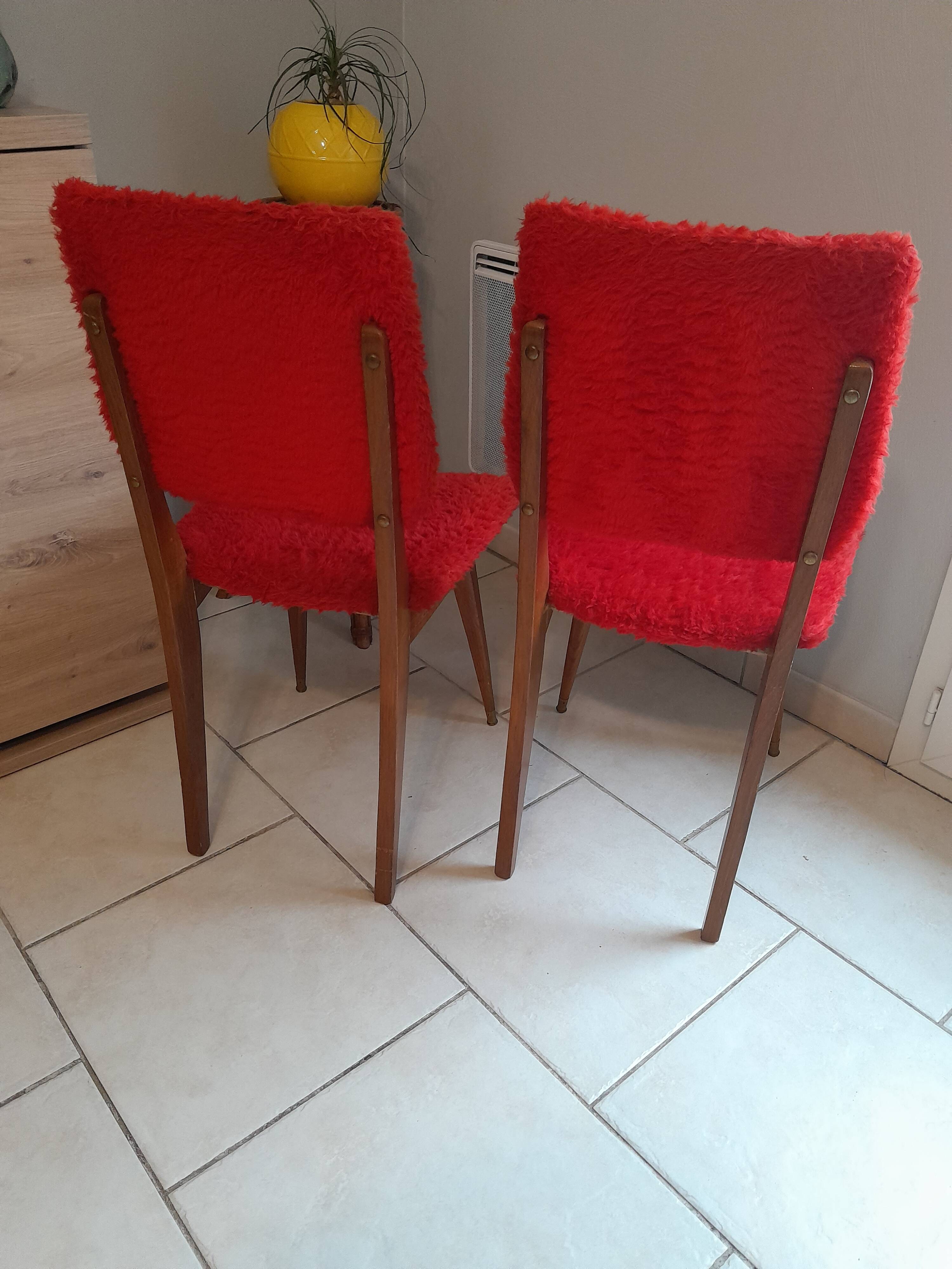 Pair of vintage red moumoute chairs with compass legs