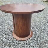 Vintage round oak coffee table with a door