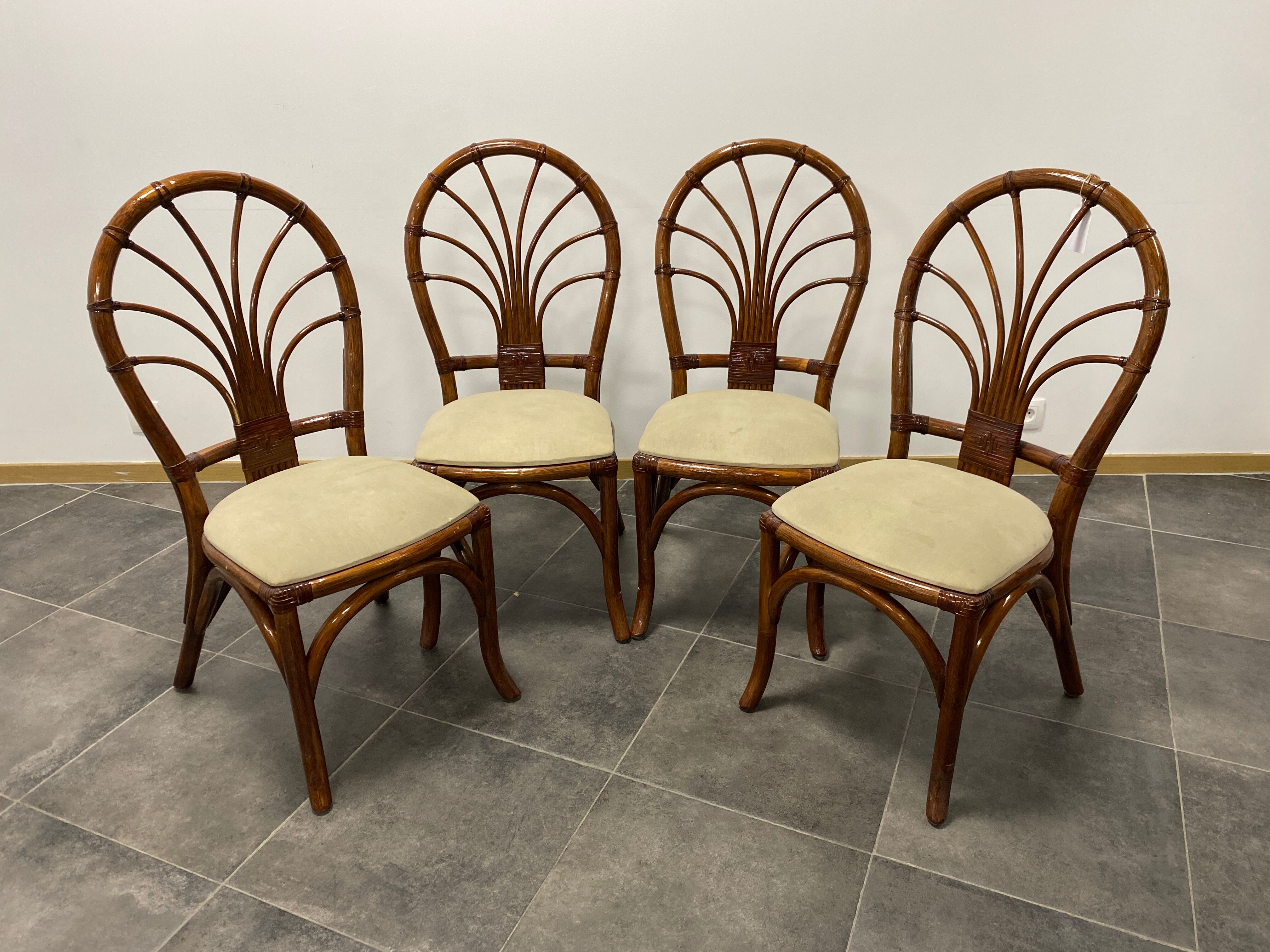 4 vintage woven rattan chairs