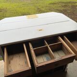 White counter with brass coin mechanism