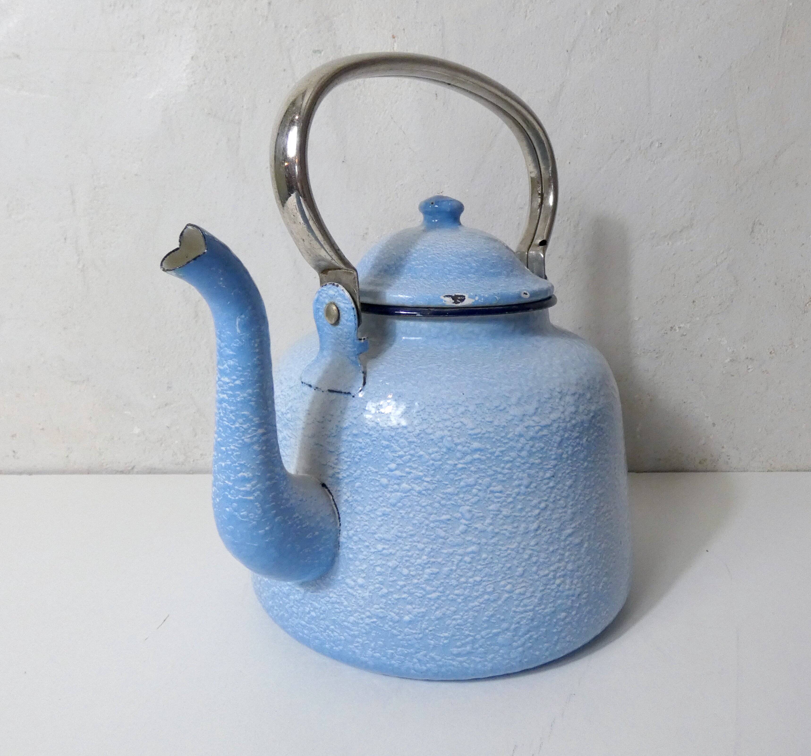 old enamelled steel kettle