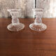Old pair of vintage round molded glass candle holder
