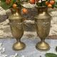 Pair of embossed brass bud vases stamped 17 cm