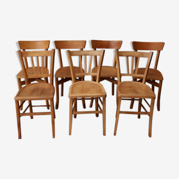 Set of 7 mismatched bistro chairs