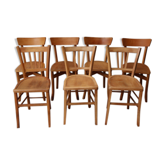 Set of 7 mismatched bistro chairs