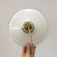 Pair of white opaline suspensions with serrated edges
