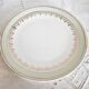 French porcelain dessert plates, green and gold.