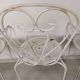 4 wrought iron garden armchairs