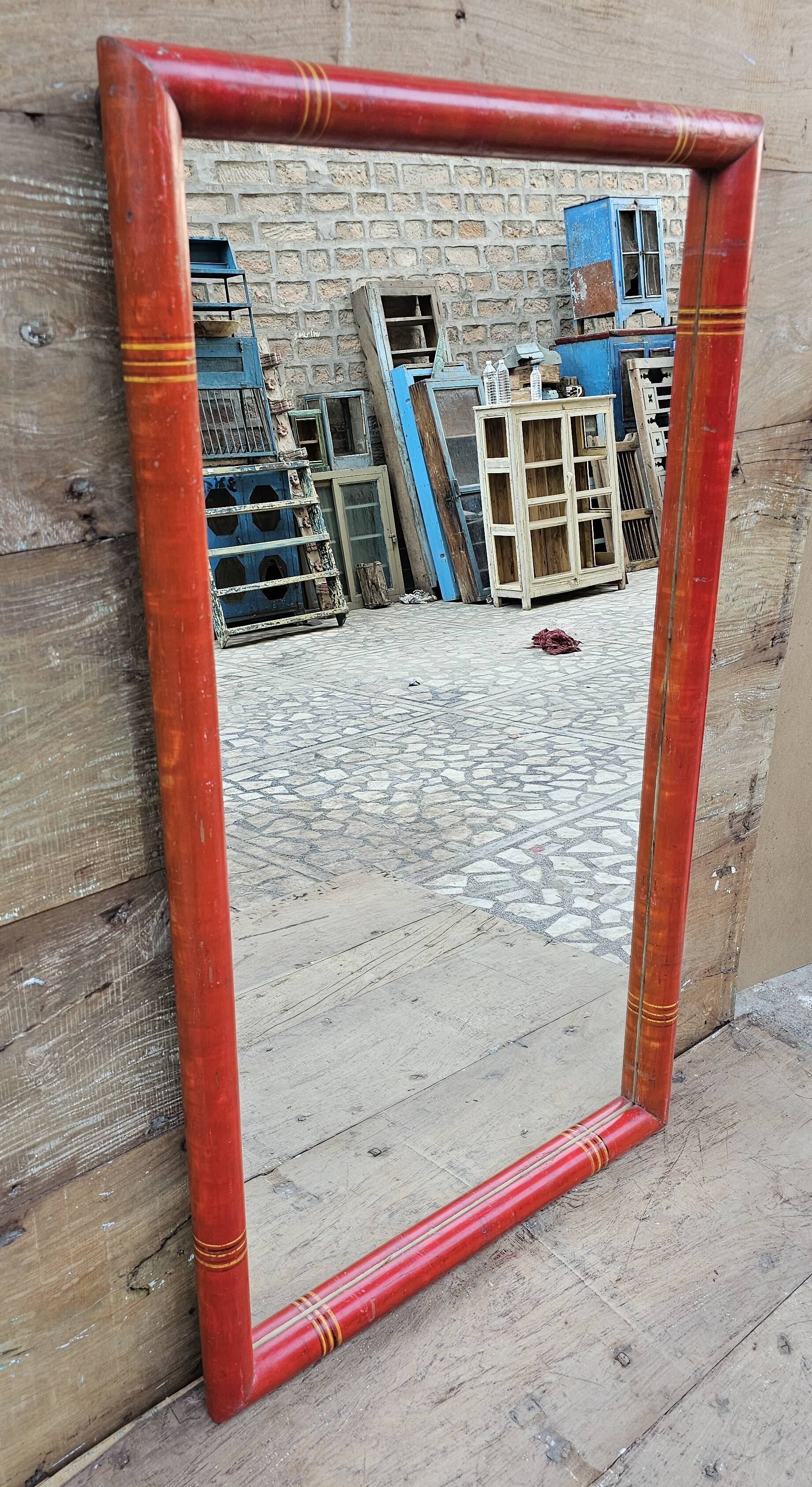 Antique mirror in Burmese teak.