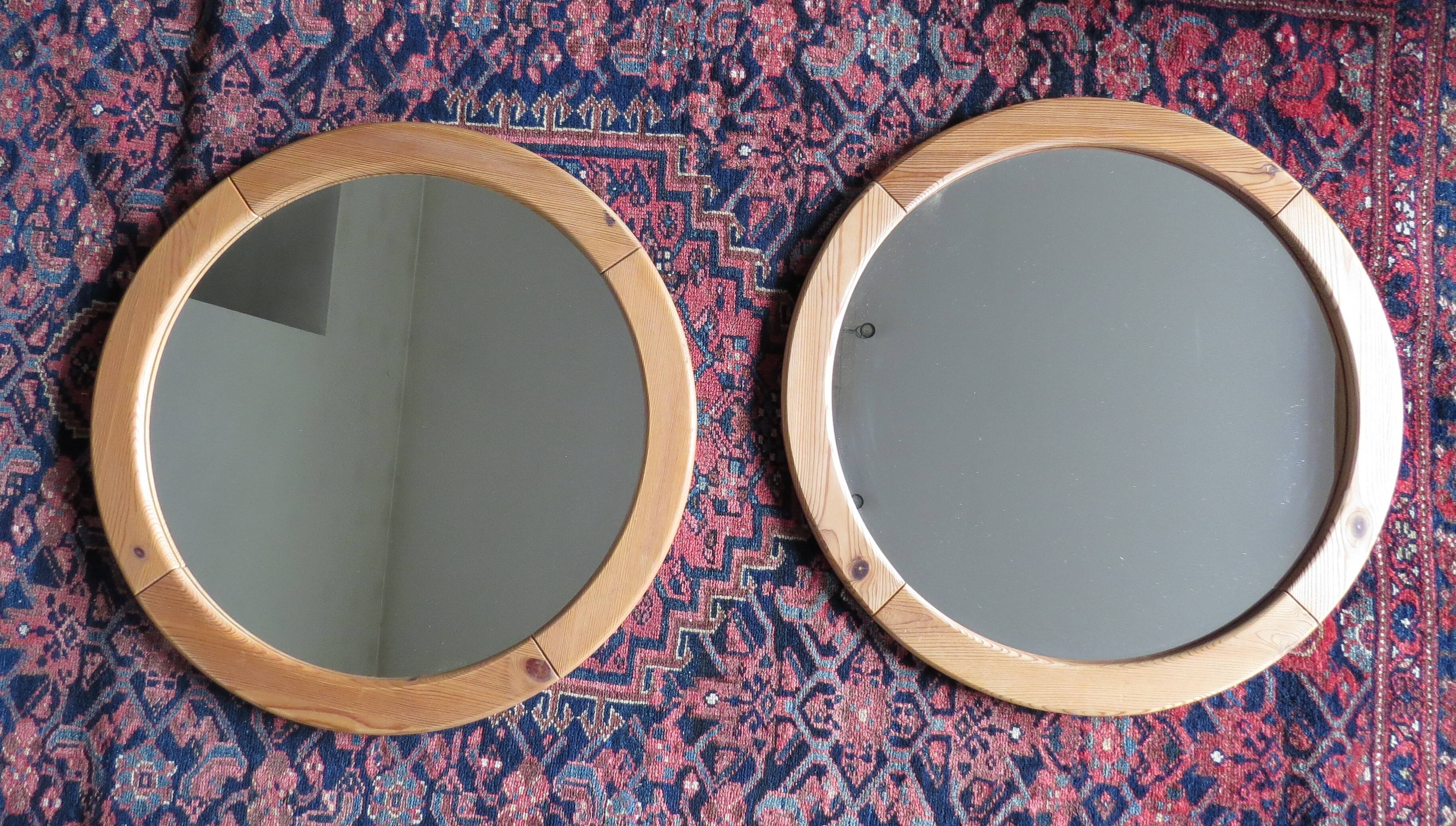 Pair of round Scandinavian pine mirrors from the 70s