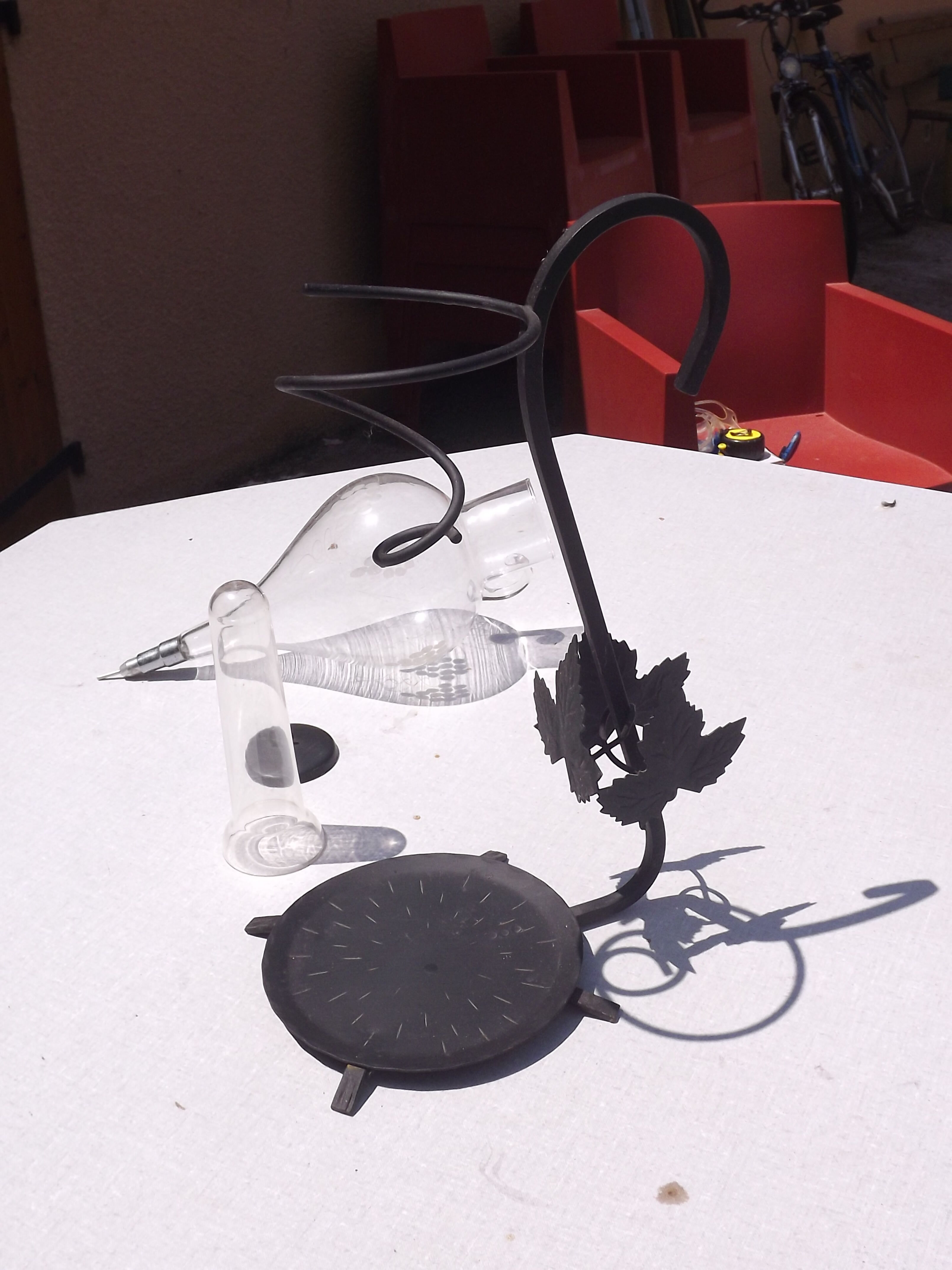 Iron and glass wine decanter