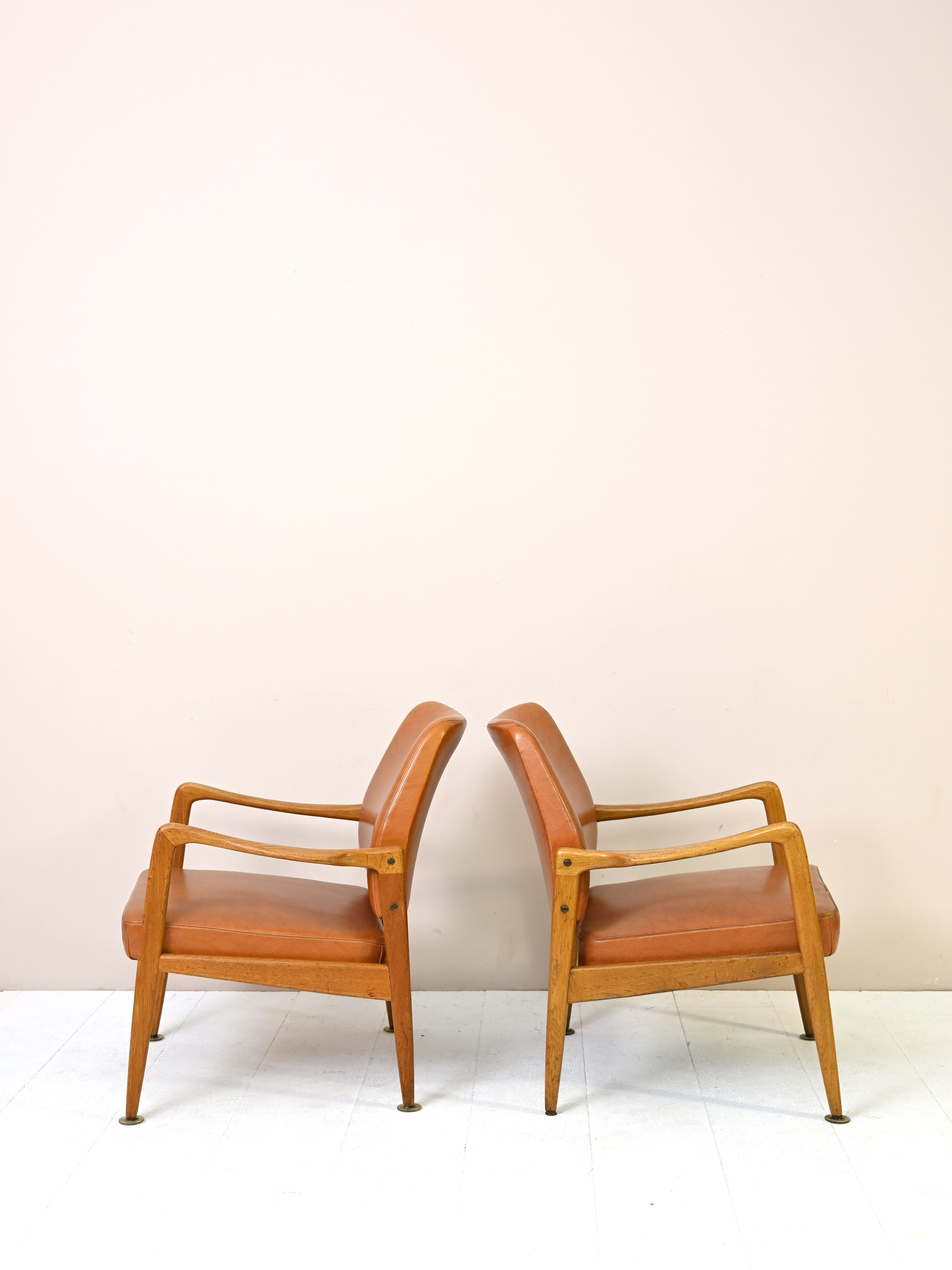 Pair of vintage Danish teak and leather armchairs