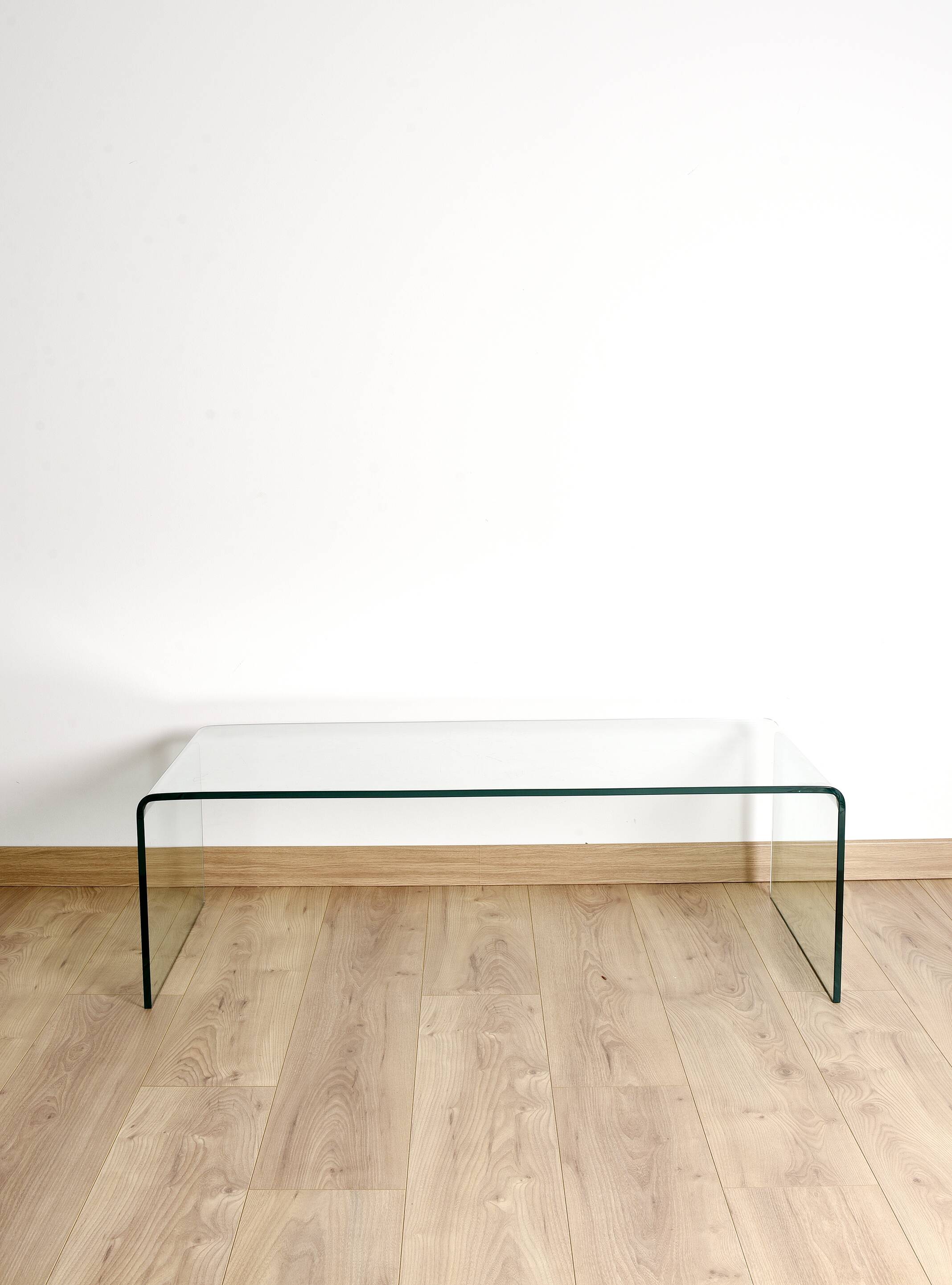 Transparent tempered glass coffee table.