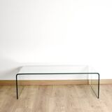 Transparent tempered glass coffee table.