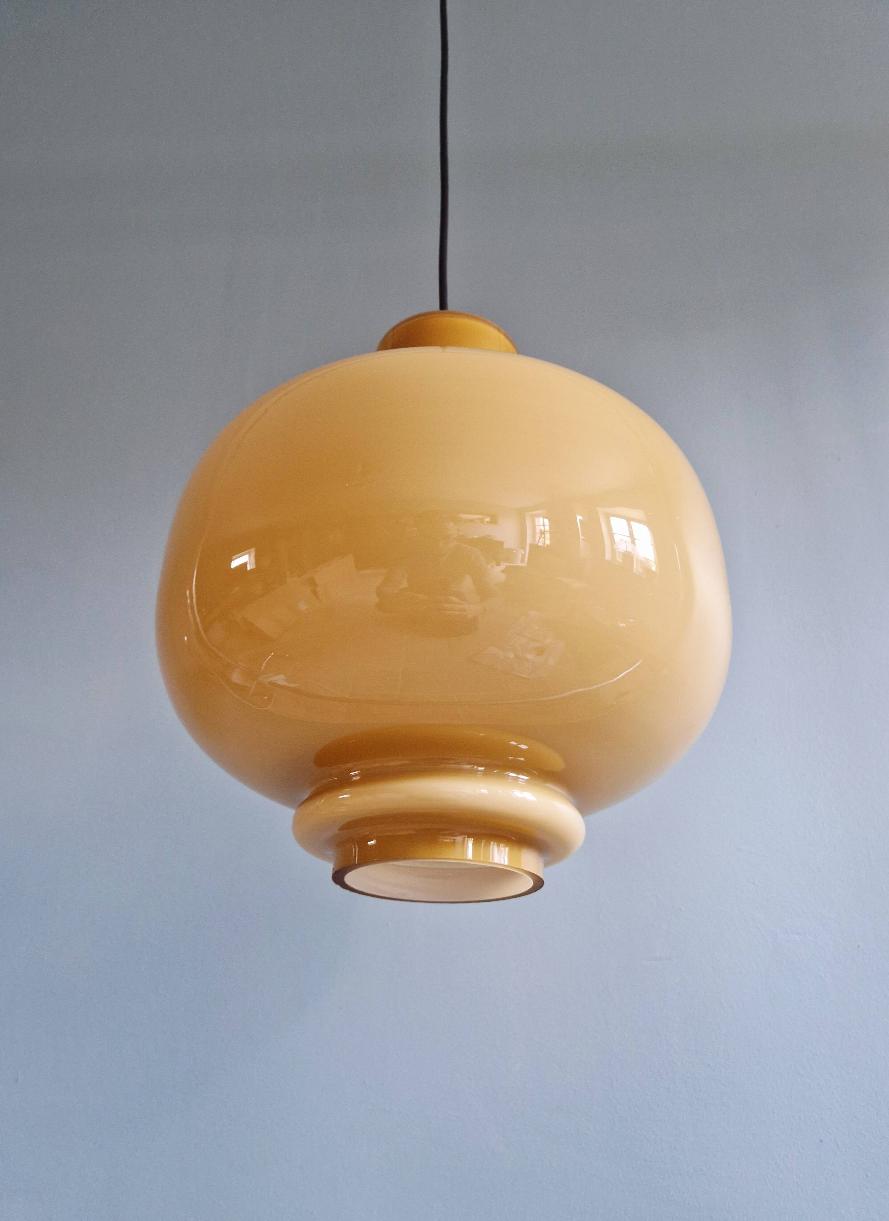 Scandinavian suspension light in mustard opaline, H-A Jakobsson, 1970.