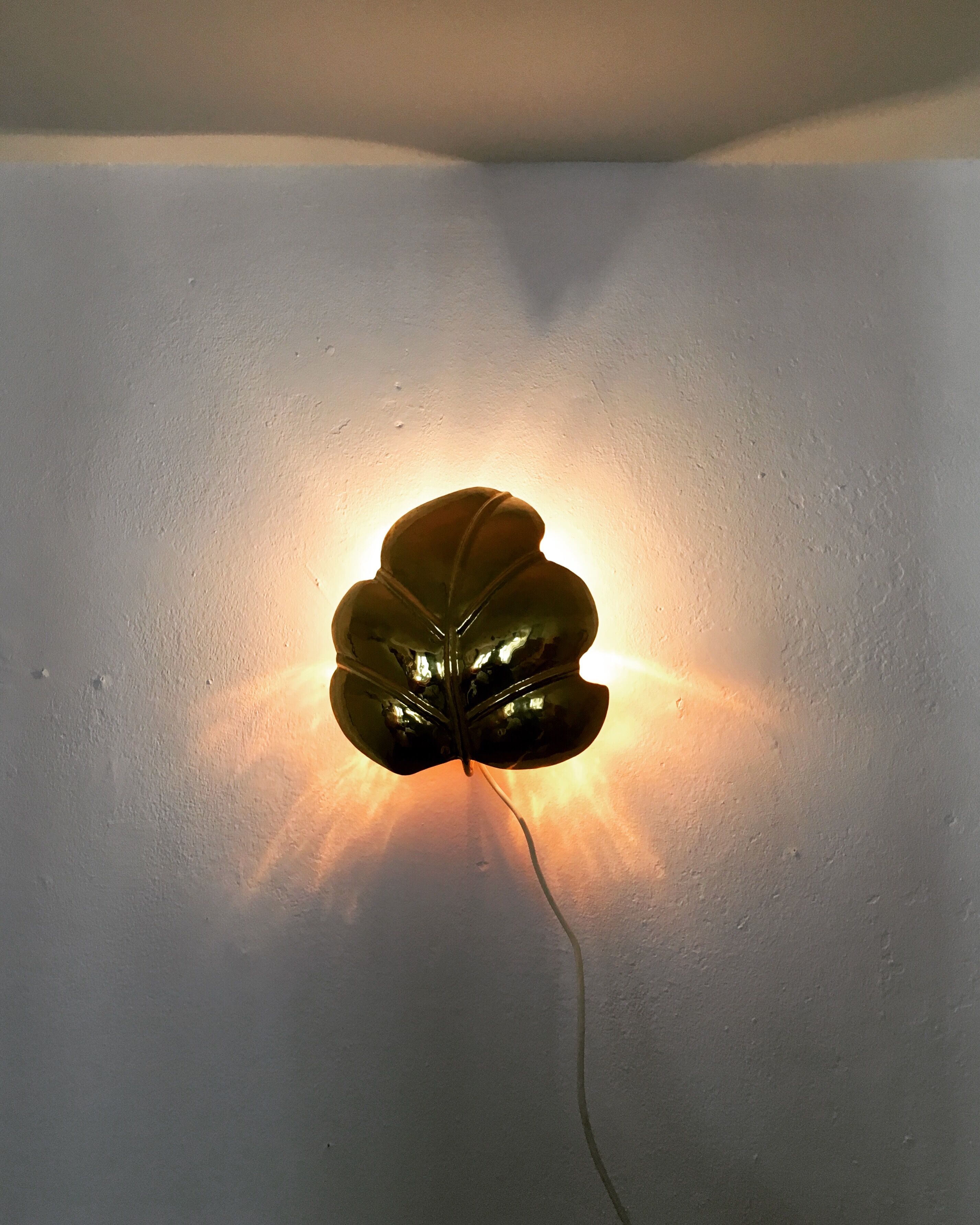 Hollywood Regency brass leaf wall lamp